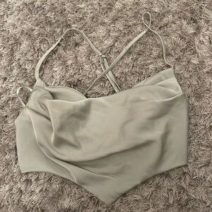 Grey going out top. Adjustable straps. New with tags.